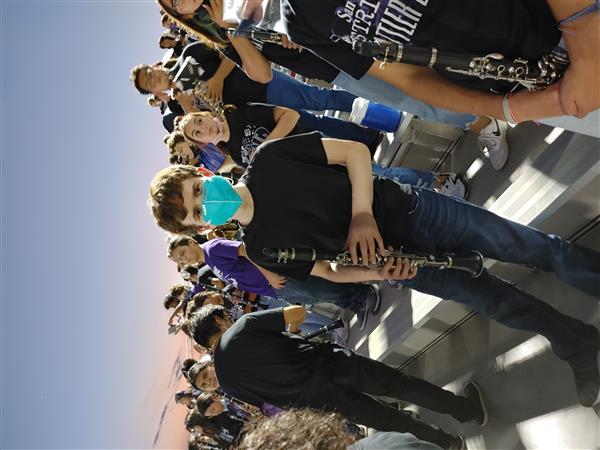 Little Rattler Night: Middle School students in football stands.
